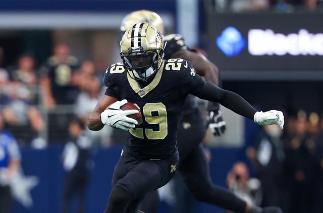 Sep 15, 2024; Arlington, Texas, USA;  New Orleans Saints cornerback Paulson Adebo (29) intercepts a ball intended for Dallas Cowboys wide receiver Jalen Brooks (not pictured) during the first half at AT&T Stadium. Mandatory Credit: Kevin Jairaj-Imagn Images/File Photo