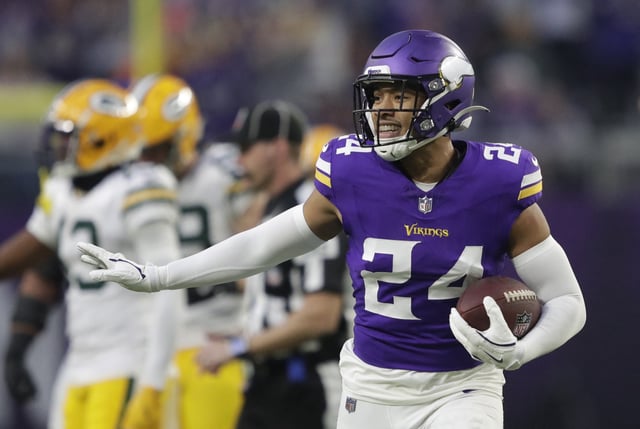 Dec 29, 2024; Minneapolis, Minnesota, USA; Minnesota Vikings safety Camryn Bynum (24) celebrates recovering a fumble by Green Bay Packers running back Josh Jacobs (8) in the first quarter at U.S. Bank Stadium. Mandatory Credit: Dan Powers/USA TODAY NETWORK-Wisconsin via Imagn Images/File Photo