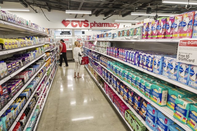 People shopping at a CVS pharmacy.