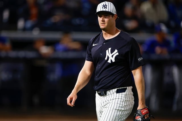 TAMPA, FLORIDA - FEBRUARY 28: Gerrit Cole #45 of the New York Yankees reacts after a strike out in the first inning during a spring training game against the Toronto Blue Jays at George M. Steinbrenner Field on February 28, 2025 in Tampa, Florida.