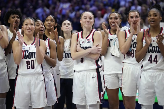 Paige Bueckers #5 of the Connecticut Huskies reacts as she is inducted into the Huskies of Honor program following an NCAA women&#39;s basketball game against the Marquette Golden Eagles at the Harry A. Gampel Pavilion on March 2, 2025 in Storrs, Connecticut.