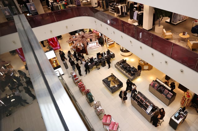 People visit the beauty department at the John Lewis retail store on Oxford Street in London, Britain, October 24, 2024. REUTERS/Hollie Adams/File photo