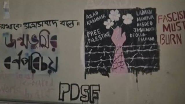Graffiti in black proclaiming 'Azad Kashmir' and 'Free Palestine' was seen on a wall near gate number three of the university. 