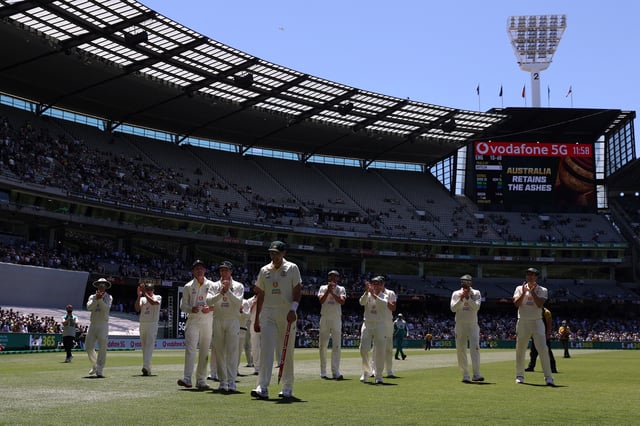 Cricket - Ashes - Third Test - Australia v England - Melbourne Cricket Ground, Melbourne, Australia - December 28, 2021  Australia's Scott Boland celebrates with teammates after winning the match and retaining the Ashes REUTERS/Loren Elliott/File Photo