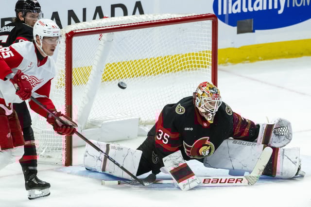 Mar 10, 2025; Ottawa, Ontario, CAN; Ottawa Senators goalie Linus Ullmark (35) makes a save in front of Detroit Red Wings left wing Elmer Soderblom (85) in the third period at the Canadian Tire Centre. Mandatory Credit: Marc DesRosiers-Imagn Images