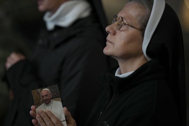 Nuns attend a Rosary prayer for Pope Francis, in St. Peter's Square at the Vatican, Monday, March 10, 2025. (AP Photo/Andrew Medichini)