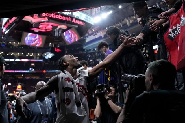 Toronto Raptors guard A.J. Lawson (0) leaves the court following sinking a three-pointer for a career high following second half NBA basketball action against the Washington Wizards, in Toronto, Monday, March 10, 2025. THE CANADIAN PRESS/Nathan Denette
