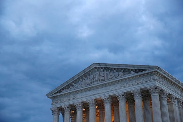 Clouds roll over the Supreme Court at dusk on Capitol Hill in Washington, Sunday, May 3, 2020. (AP Photo/Patrick Semansky)