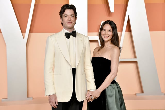 John Mulaney and Olivia Munn arrive at the Vanity Fair Oscar Party on Sunday, March 2, 2025, at the Wallis Annenberg Center for the Performing Arts in Beverly Hills, Calif. (Photo by Evan Agostini/Invision/AP)
