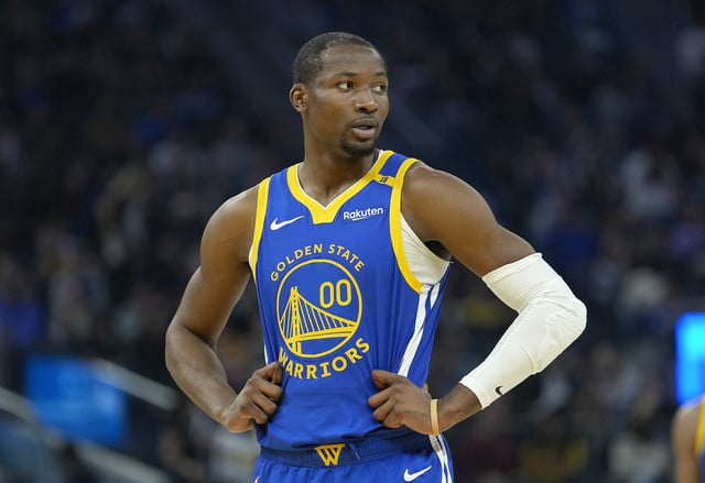 Jonathan Kuminga #00 of the Golden State Warriors looks on against the Indiana Pacers during the first half of an NBA basketball game at Chase Center on December 23, 2024 in San Francisco, California.