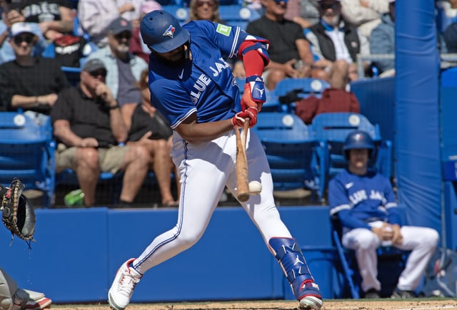 Vladimir Guerrero Jr. #27 of the Toronto Blue Jays bats during a spring training game against the Boston Red Sox at TD Ballpark on March 6, 2025 in Dunedin, Florida.