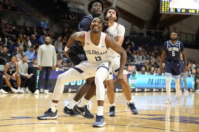 Antallah Sandlin-El #13 of the Robert Morris Colonials protects the lane during an exhibition college basketball game against the Villanova Wildcats at Finneran Pavilion on October 27, 2024 in Villanova, Pennsylvania.