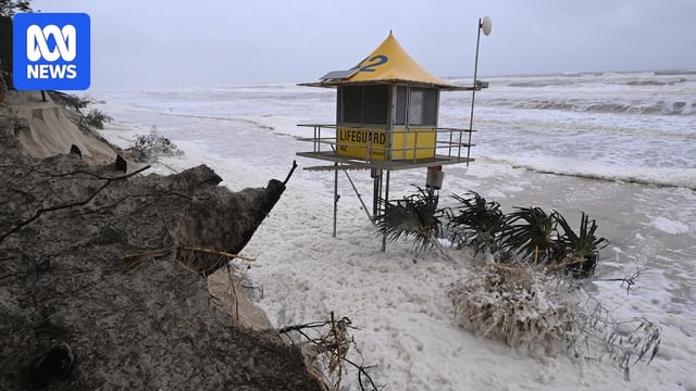 lifeguard tower in sand falling over
