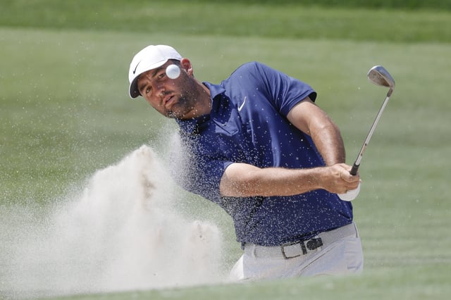 Mar 8, 2025; Orlando, Florida, USA;  Scottie Scheffler plays a shot from a bunker on the second hole during the third round of the Arnold Palmer Invitational golf tournament at Bay Hill. Mandatory Credit: Reinhold Matay-Imagn Images/File Photo
