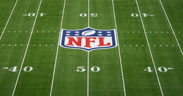 Feb 12, 2023; Glendale, AZ, USA; A general view of the NFL shield logo on the field before Super Bowl LVII between the Kansas City Chiefs and Philadelphia Eagles at State Farm Stadium. Mandatory Credit: Kirby Lee-USA TODAY Sports/File Photo