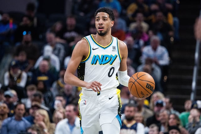 Mar 11, 2025; Indianapolis, Indiana, USA;Indiana Pacers guard Tyrese Haliburton (0) dribbles the ball in the first half against the Milwaukee Bucks  at Gainbridge Fieldhouse. Mandatory Credit: Trevor Ruszkowski-Imagn Images