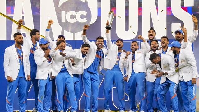 Indian cricket team celebrate holding the trophy after their win against New Zealand in the ICC Champions Trophy 2025 final