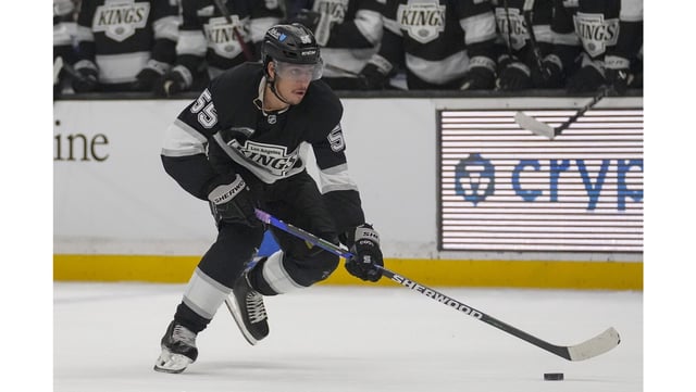 Kings right wing Quinton Byfield skates down the ice with the puck during the second period of their game against the New York Islanders on Tuesday night at Crypto.com Arena. Byfield had a goal as the Kings won their third straight game, 4-1. (AP Photo/Eric Thayer)