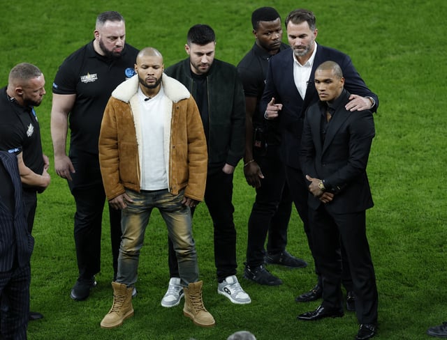 Boxing - Chris Eubank Jr and Conor Benn Press Conference - Tottenham Hotspur Stadium, London, Britain - February 27, 2025 Chris Eubank Jr and Conor Benn pose on the pitch after the press conference Action Images via Reuters/Peter Cziborra/File Photo