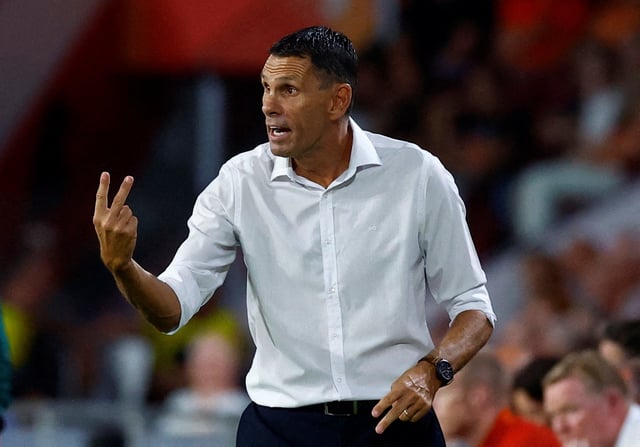 Soccer Football - Euro 2024 Qualifier - Group B - Netherlands v Greece - Philips Stadium, Eindhoven, Netherlands - September 7, 2023 Gus Poyet gestures REUTERS/Piroschka Van De Wouw/File Photo
