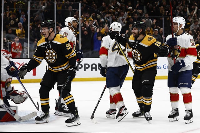 Mar 11, 2025; Boston, Massachusetts, USA; Boston Bruins center Pavel Zacha (18) and center Morgan Geekie (39) celebrate ZachaÕs go ahead goal against the Florida Panthers during the third period at TD Garden. Mandatory Credit: Winslow Townson-Imagn Images