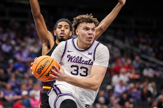 Mar 11, 2025; Kansas City, MO, USA; Kansas State Wildcats guard Coleman Hawkins (33) drives to the basket during the first half against the Arizona State Sun Devils at T-Mobile Center. Mandatory Credit: William Purnell-Imagn Images