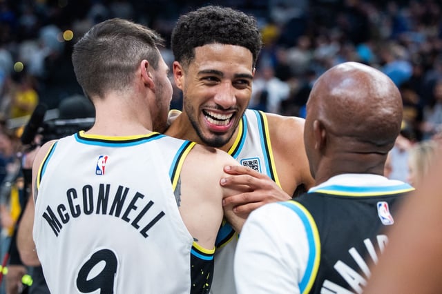 Mar 11, 2025; Indianapolis, Indiana, USA; Indiana Pacers guard Tyrese Haliburton (0) and guard T.J. McConnell (9) celebrate the win over Milwaukee Bucks at Gainbridge Fieldhouse.