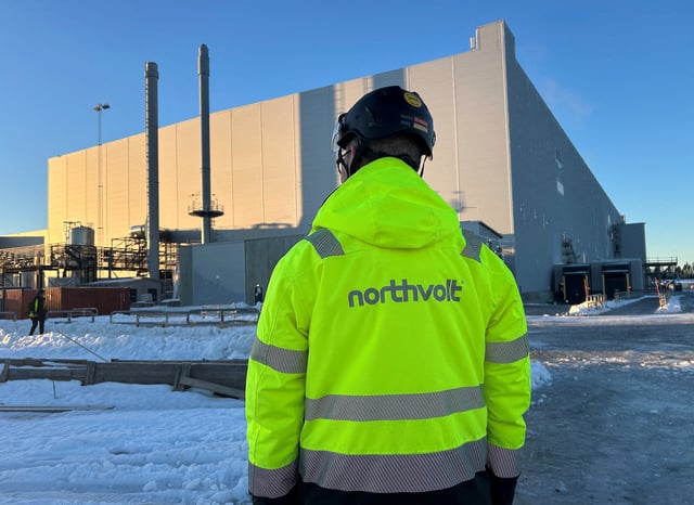 A man stands in front of the Northvolt Ett factory in Skelleftea, Sweden, November 27, 2024. REUTERS/Marie Mannes/File Photo