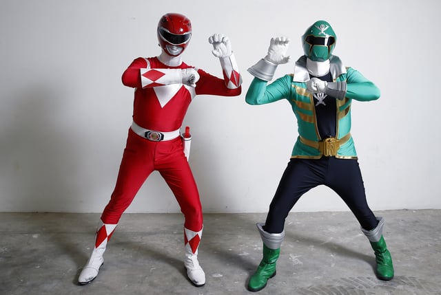 Cosplayers dressed in Power Rangers costumes at a manga show on November 4, 2016, in Paris, France.