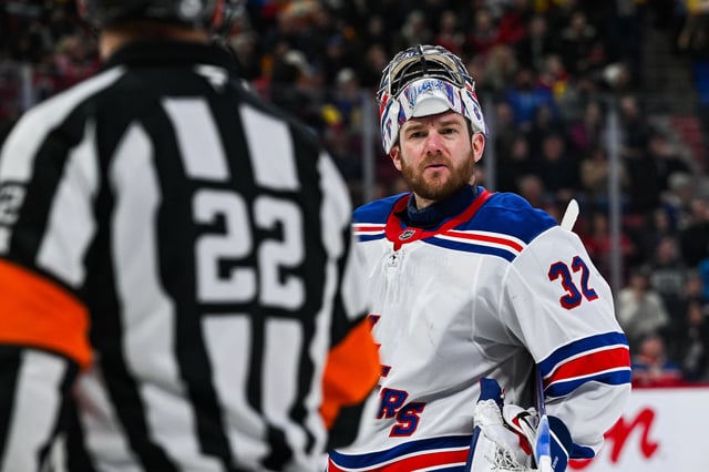 Jan 19, 2025; Montreal, Quebec, CAN; New York Rangers goalie Jonathan Quick (32) argues with NHL referee Ghislain Hebert (22) against the Montreal Canadiens during the second period at Bell Centre. Mandatory Credit: David Kirouac-Imagn Images/ File Photo