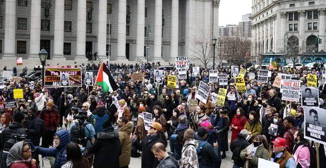 Pro-Palestinian protestors rally in support of Mahmoud Khalil outside of the Thurgood Marshall Courthouse, where a hearing is underway regarding Khalil's arrest, in New York City on March 12, 2025. Khalil, a recent graduate and one of the most prominent faces of the university's high-profile protests, was arrested by US immigration officials over the weekend despite holding a permanent residency green card. Protesters in New York and rights groups have expressed outrage over the arrest of Khalil, a leader of pro-Palestinian demonstrations at Columbia University, as President Donald Trump vowed further crackdowns. (Photo by CHARLY TRIBALLEAU / AFP) (Photo by CHARLY TRIBALLEAU/AFP via Getty Images)