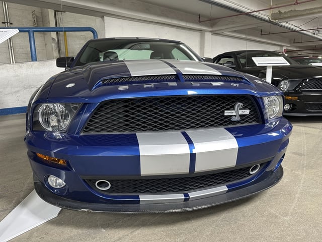 A 2008 Ford Mustang Shelby GT500KR, part of Ford Motor Co.'s Heritage Fleet, is on display Wednesday, March 12, 2025, in Dearborn, Mich. (AP Photo/Mike Householder)