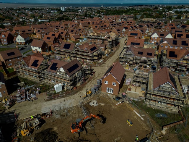 A drone view shows construction work taking place on new homes at Whitstable Heights a new housing development, as the UK government aims to build 1.5 million new homes, in Whitstable, Britain, September 11, 2024. REUTERS/Chris J. Ratcliffe/File Photo