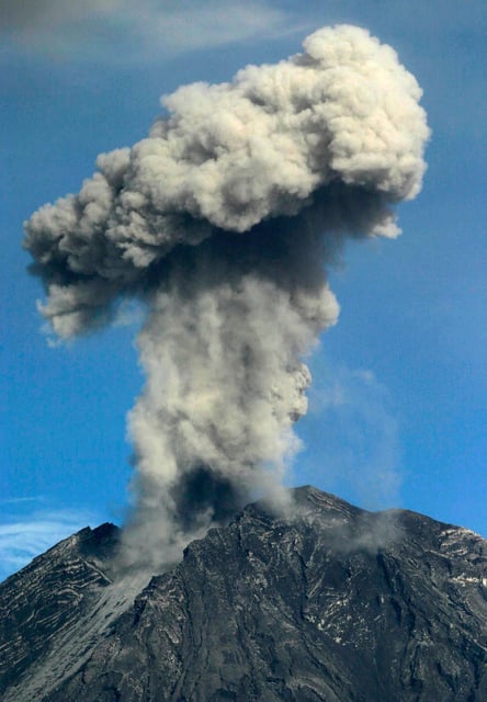 Indonesia's Mount Semeru volcano spews smoke southeast of Surabaya, the capital of East Java, on March 18, 2007. Indonesia is a vast archipelago of some 17,000 islands that lie along the geologically active "Pacific Ring of Fire" with more than 100 active volcanoes. REUTERS/Sigit Pamungkas (INDONESIA)