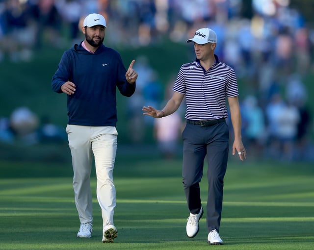PONTE VEDRA BEACH, FLORIDA - MARCH 15: Scottie Scheffler of the United States and Justin Thomas of the United States walk the tenth fairway during the second round of THE PLAYERS Championship on the Stadium Course at TPC Sawgrass on March 15, 2024 in Ponte Vedra Beach, Florida.