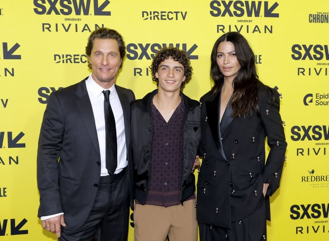 Levi Alves McConaughey, center, poses with his parents, Matthew McConaughey and Camila Alves McConaughey, at the premiere of "The Rivals Of Amziah King” in Austin, Texas, on March 10.