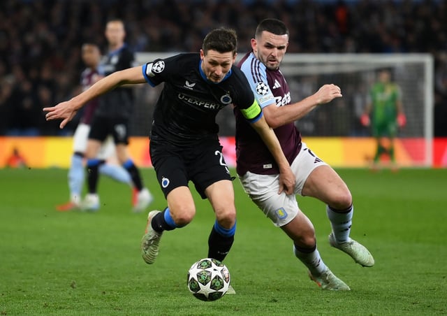 Soccer Football - Champions League - Round of 16 - Second Leg - Aston Villa v Club Brugge - Villa Park, Birmingham, Britain - March 12, 2025 Aston Villa's John McGinn in action with Club Brugge's Hans Vanaken REUTERS/Jaimi Joy