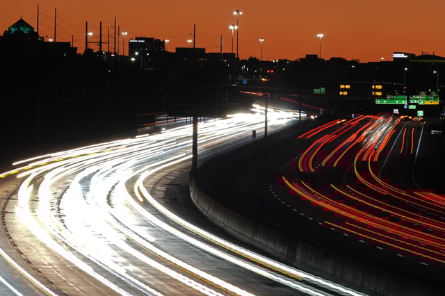 FILE - Traffic flows on Interstate 435 on Sept. 25, 2024, in Leawood, Kan. (AP Photo/Charlie Riedel, File)