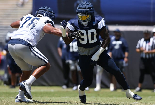 Jul 30, 2024; Oxnard, CA, USA; Dallas Cowboys defensive end DeMarcus Lawrence (90) rushes against offensive tackle Terence Steele (78) during training camp at the River Ridge Playing Fields in Oxnard, California. Mandatory Credit: Jason Parkhurst-USA TODAY Sports/File Photo