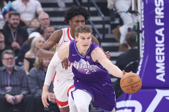 Feb 22, 2025; Salt Lake City, Utah, USA; Utah Jazz forward Lauri Markkanen (23) brings the ball up the court against Houston Rockets forward Amen Thompson (back) during the first half at Delta Center. Mandatory Credit: Rob Gray-Imagn Images/File Photo
