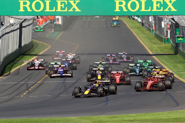 Max Verstappen of the Netherlands driving the (1) Oracle Red Bull Racing RB20 leads Carlos Sainz of Spain driving (55) the Ferrari SF-24 and the rest of the field into the first corner at the start of the race during the F1 Grand Prix of Australia at Albert Park Circuit on March 24, 2024 in Melbourne, Australia.