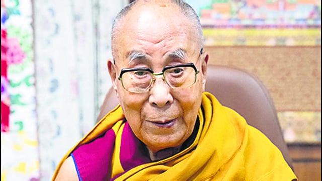 The Dalai Lama poses with his new book Voice for the Voiceless in this photograph posted on his X account on January 24, 2025. (via REUTERS)