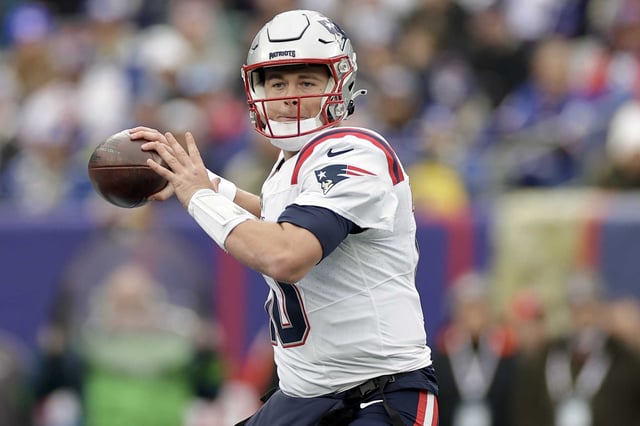 New England Patriots quarterback Mac Jones (10) passes against the New York Giants during the first quarter of an NFL football game, Sunday, Nov. 26, 2023, in East Rutherford, N.J.