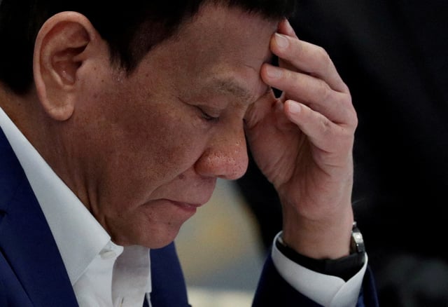 Philippine President Rodrigo Duterte attends a plenary session during the 34th ASEAN Summit in Bangkok, Thailand, June 22, 2019. REUTERS/Jorge Silva/File Photo