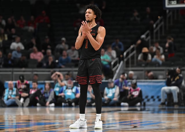 Mar 12, 2025; Indianapolis, IN, USA; USC Trojans guard Desmond Claude (1) celebrates after a play during the second half against the Rutgers Scarlet Knights at Gainbridge Fieldhouse. Mandatory Credit: Robert Goddin-Imagn Images