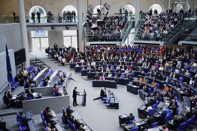 Bernd Baumann executive director of the Alternative for Germany, AfD, parliamentary group speaks during a meeting of the German federal parliament, Bundestag, at the Reichstag building in Berlin, Germany, Thursday, March 13, 2025. (AP Photo/Ebrahim Noroozi)