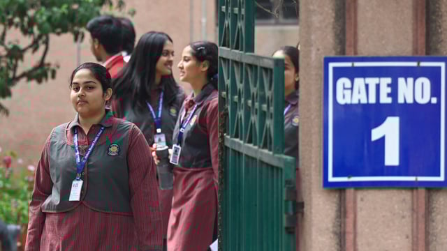 Students exit the examination center after appearing for the Class 12 English CBSE exam at Cambridge School, Sector 27, in Noida, India, on Tuesday, March 11, 2025. 