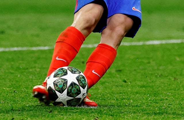 Soccer Football - Champions League - Round of 16 - Second Leg - Atletico Madrid v Real Madrid - Metropolitano, Madrid, Spain - March 12, 2025 Atletico Madrid's Julian Alvarez scores a penalty during the penalty shootout which is later disallowed after a VAR review for a double touch. REUTERS/Susana Vera/File Photo
