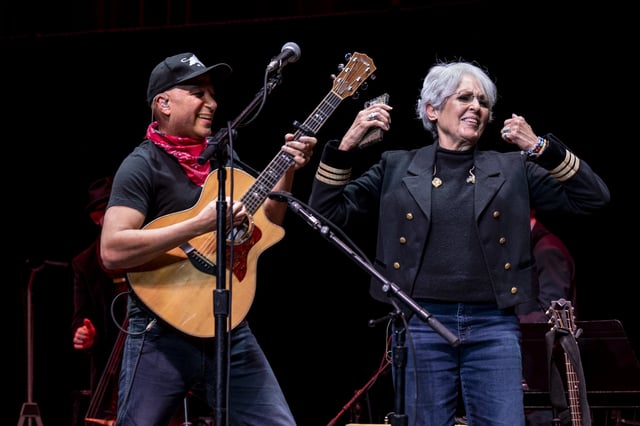 Joan Baez, right, and Tom Morello perform during a tribute to the folk singer at the Masonic Auditorium in San Francisco on Feb. 8.