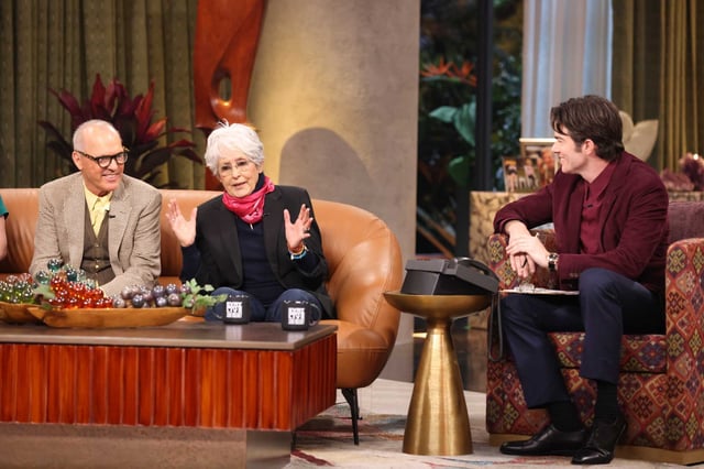 Bay Area folk legend Joan Baez speaks to host John Mulaney, right, as actor Michale Keaton listens on the global premiere of the Netflix talk show “Everybody’s Live with John Mulaney” on Wednesday, March 12.